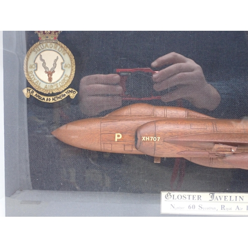 1467 - A well-made carved half round Model of a Gloster Javelin - F(AW) 9R, presented in a glazed wooden ca... 