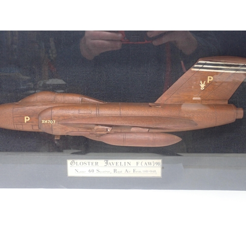 1467 - A well-made carved half round Model of a Gloster Javelin - F(AW) 9R, presented in a glazed wooden ca... 