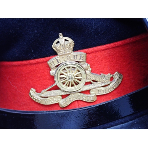 1489 - A box of Military Caps and Hats including Royal Horse Artillery, Hong Kong Police, Royal Australian ... 