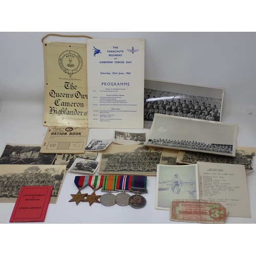 1477 - A Group of WWII Medal comprising 1939-45 Star, Italy Star, War and Defence Medals and a General Serv... 