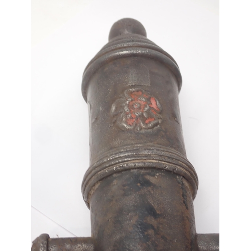 1492 - A pair of 19th Century Signalling Cannons with cast and red painted rose motifs 18in L