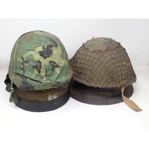 1455 - A box of military steel Helmets, Machetes, etc