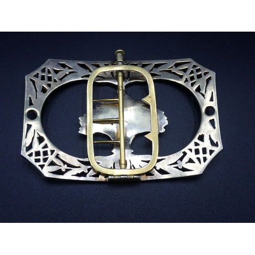 10 - A large French silver-gilt Nurse's Buckle of chamfered rectangular form with central basket of fruit... 