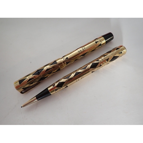 111 - A Waterman's filigree Lady Patricia Fountain Pen and Propelling Pencil, engraved initials H.P