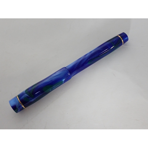 117 - A Conway Stewart Fountain Pen with 18k nib in petrol blue and green case