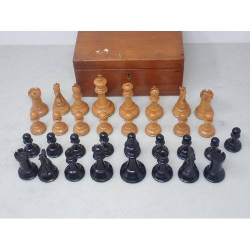 129 - A Jaques boxwood and ebony Chess Set stamped 'Jaques, London' in mahogany two division Box