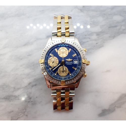 134 - A 2002 Breitling Chronometre Automatic Wristwatch the dark blue dial with gold coloured hourly baton... 