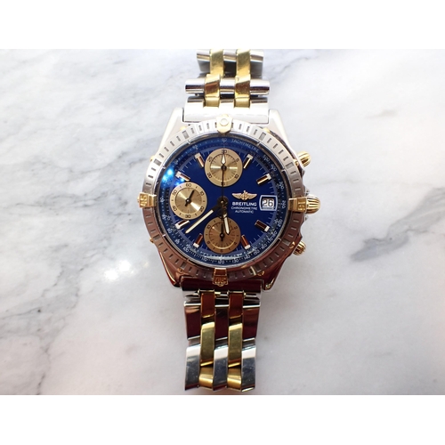 134 - A 2002 Breitling Chronometre Automatic Wristwatch the dark blue dial with gold coloured hourly baton... 