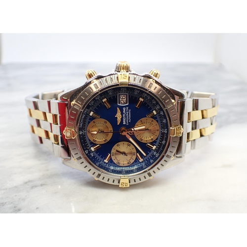 134 - A 2002 Breitling Chronometre Automatic Wristwatch the dark blue dial with gold coloured hourly baton... 