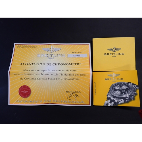 134 - A 2002 Breitling Chronometre Automatic Wristwatch the dark blue dial with gold coloured hourly baton... 