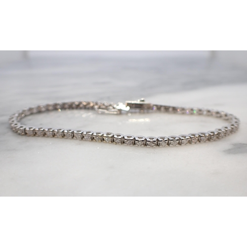 145 - A Diamond Tennis Bracelet set brilliant-cut stones throughout in 18ct white gold, total diamond weig... 