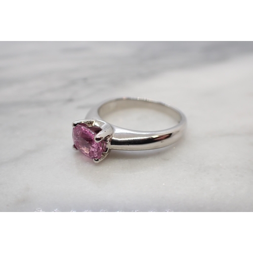 159 - A Pink Sapphire Ring claw-set cushion-cut stone, 1.33cts, in 18ct white gold, ring size K 1/2