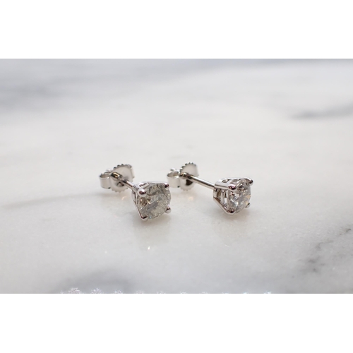 172 - A pair of Diamond Ear Studs each claw-set brilliant-cut stone , total diamond weight 1.01cts, in 18c... 