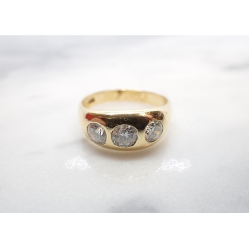 188 - A Diamond three stone Ring gypsy-set graduated brilliant-cut stones (centre stone chipped), stamped ... 