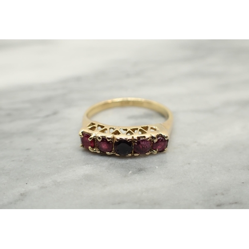 191 - A Ruby five stone Ring claw-set round stones in various shades in 18ct gold, ring size O 1/2, approx... 