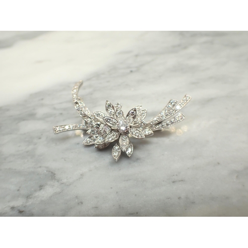 193 - A Diamond Flower Spray Brooch set throughout brilliant-cut stones, 47mm wide, approx 12.50gms