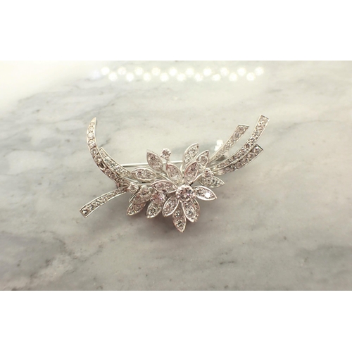 193 - A Diamond Flower Spray Brooch set throughout brilliant-cut stones, 47mm wide, approx 12.50gms