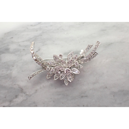 193 - A Diamond Flower Spray Brooch set throughout brilliant-cut stones, 47mm wide, approx 12.50gms