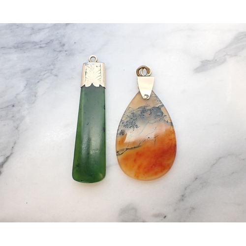 209 - A drop shaped Agate Pendant on 9ct gold mount and a Nephrite Pendant on yellow metal mount