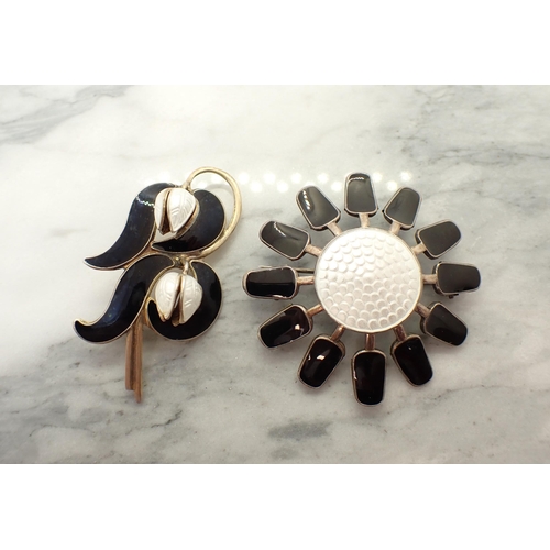 216 - Two AKSEL HOLMSEN Norwegian sterling silver and black and white enamel flower Brooches; one sunflowe... 