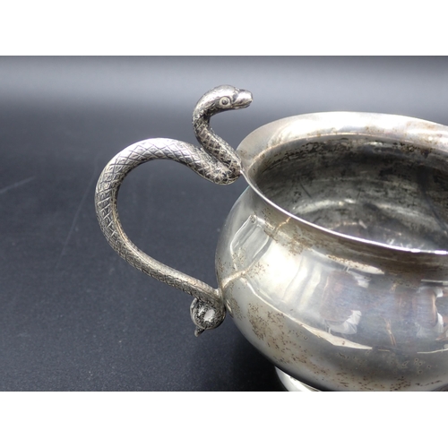 27 - A white metal Sugar Bowl and Jug with serpent handles