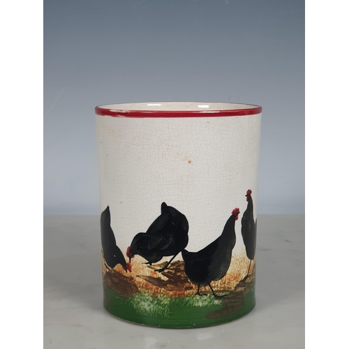 298 - A Wemyss Ware large Mug, decorated chickens, with puce rim and handle, 5¾in H, A/F, impressed mark t... 