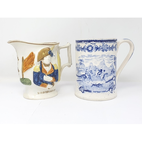 307 - A 19th Century English pottery Jug with relief moulded portraits of Lord Wellington and General Hill... 