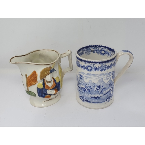 307 - A 19th Century English pottery Jug with relief moulded portraits of Lord Wellington and General Hill... 