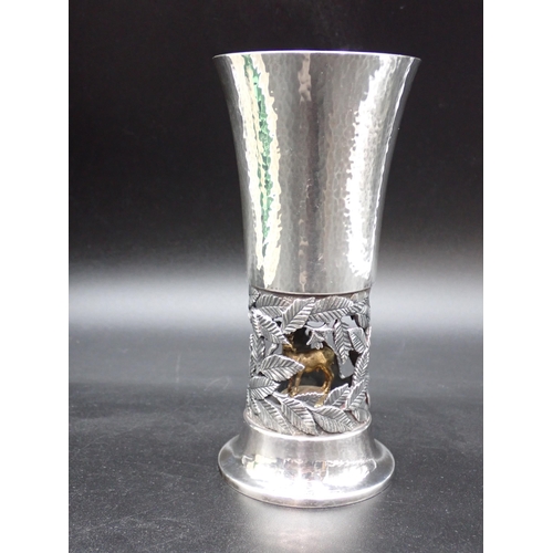 31 - An Elizabeth II silver Epping Forest Goblet with hammered design, the base with pierced leafage encl... 