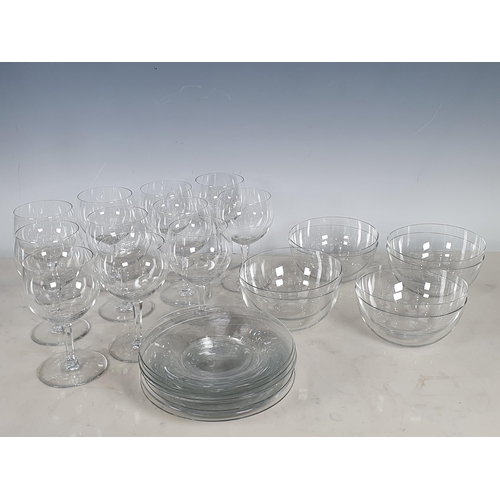 316 - A set of eleven Baccarat Wine Glasses in the Paris goblet style with panel cut stems and acid etched... 