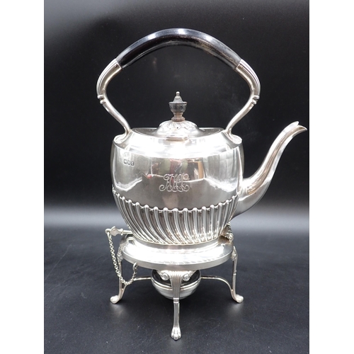 32 - A Victorian silver oval Kettle of semi-fluted form on stand with scroll supports and paw feet, compl... 