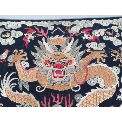 330 - A 19th Century Chinese Imperial silk embroidered Rank Badge, depicting a five-clawed dragon chasing ... 