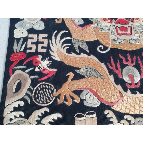 330 - A 19th Century Chinese Imperial silk embroidered Rank Badge, depicting a five-clawed dragon chasing ... 