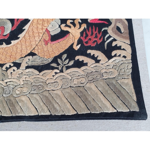 330 - A 19th Century Chinese Imperial silk embroidered Rank Badge, depicting a five-clawed dragon chasing ... 