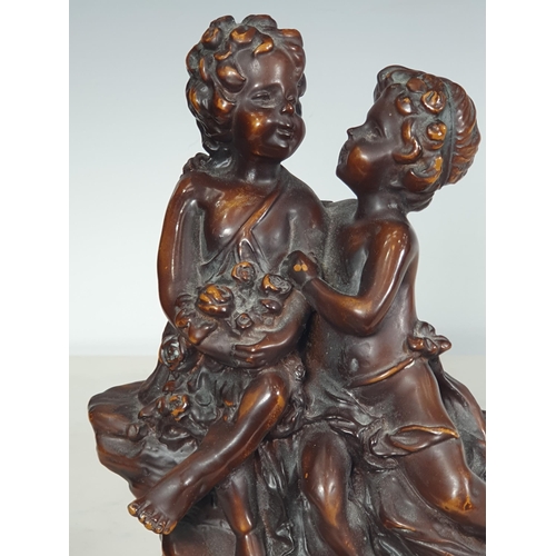 354 - A bronze Figure Group of two cherubs holding flowers on rectangular marble base, 8in H, bears signat... 