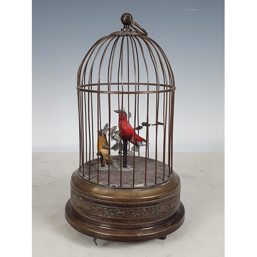 355 - An early 20th Century Continental singing bird Automaton with two song birds on branch with foliage,... 