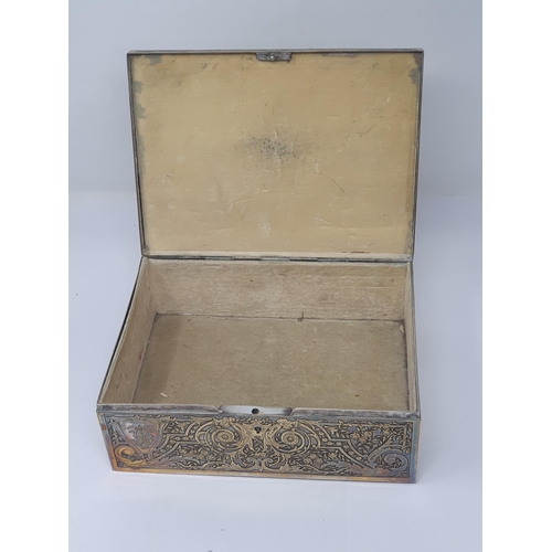 357 - A silver plated Sewing or Jewellery Box with engraved Parisian Scene to lid titled 'Le Tour est Joue... 