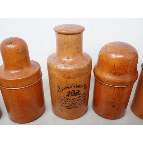 369 - A Collection of treen Bottle Holders, Jars, etc, and a brass Cribbage Board