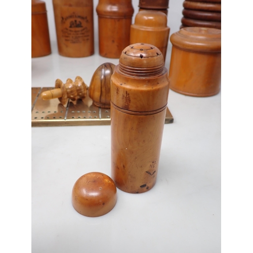 369 - A Collection of treen Bottle Holders, Jars, etc, and a brass Cribbage Board