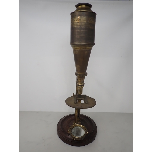 377 - A 19th Century brass Microscope inscribed J. Dancer, Liverpool, with adjustable table and mirror, on... 