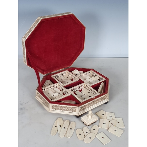 422 - A 19th Century Russian Bone Games Box with hinged octagonal cover, said to be made in Arkangel, cont... 