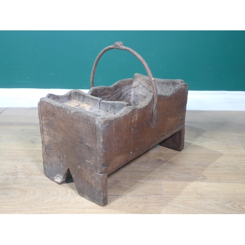 434 - An antique primitive elm Farrier's Box of boarded construction with iron handle on v-cut end support... 