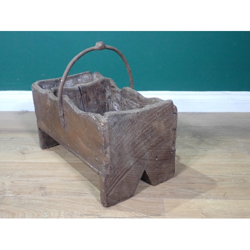 434 - An antique primitive elm Farrier's Box of boarded construction with iron handle on v-cut end support... 