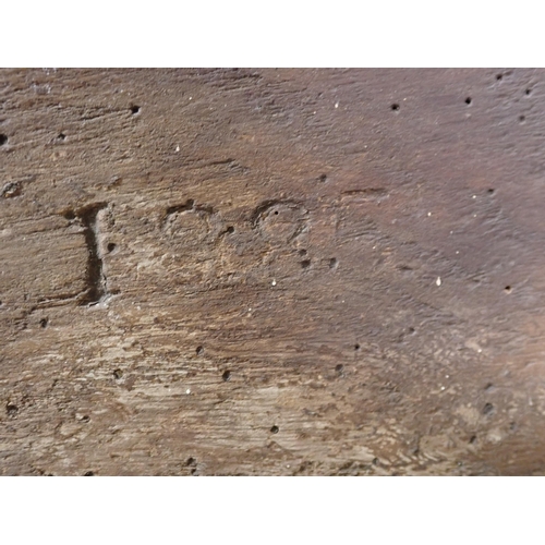 434 - An antique primitive elm Farrier's Box of boarded construction with iron handle on v-cut end support... 