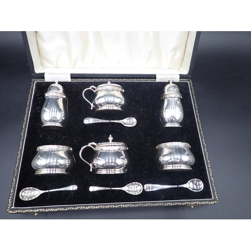 45 - An Elizabeth II silver six-piece Condiment Set of bellied form, Birmingham 1979, in case