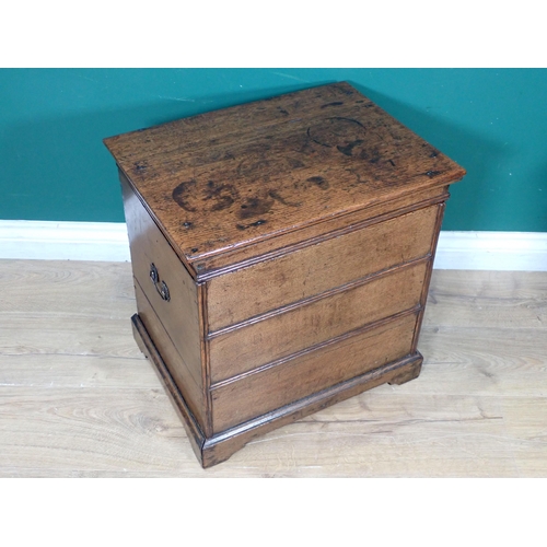 450 - An early 18th Century oak Box Stool/Commode with hinged lid above three simulated drawers on bracket... 