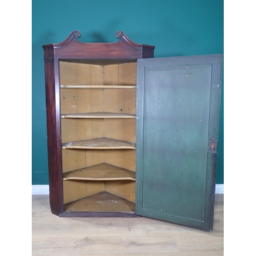 454 - A Georgian mahogany standing Corner Cupboard with scroll surmount 5ft H x 3ft W