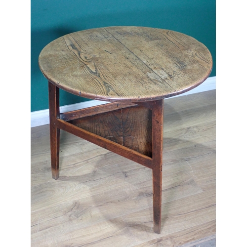 455 - An 18th Century oak and elm Cricket Table with lower tier mounted on triangular cut supports 2ft 6in... 