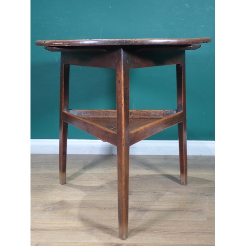 455 - An 18th Century oak and elm Cricket Table with lower tier mounted on triangular cut supports 2ft 6in... 