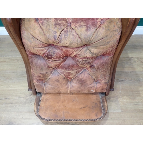 457 - A Victorian mahogany framed metamorphic reclining Armchair with brown leather button upholstery moun... 